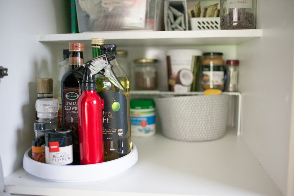 Organized Tiny Kitchen Oils and Vinegar Shelf
