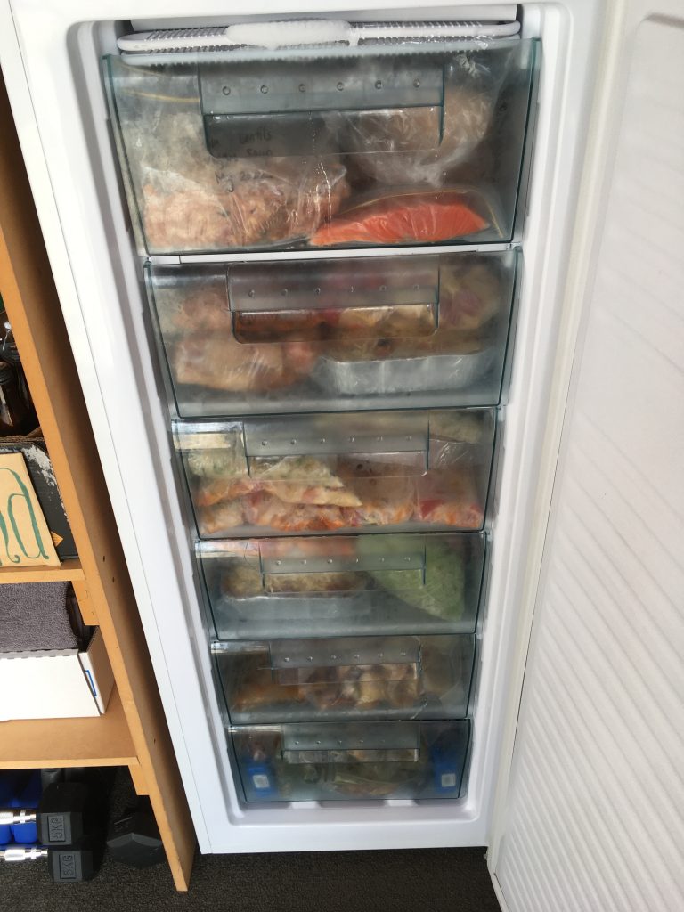 stocked freezer for postpartum meals