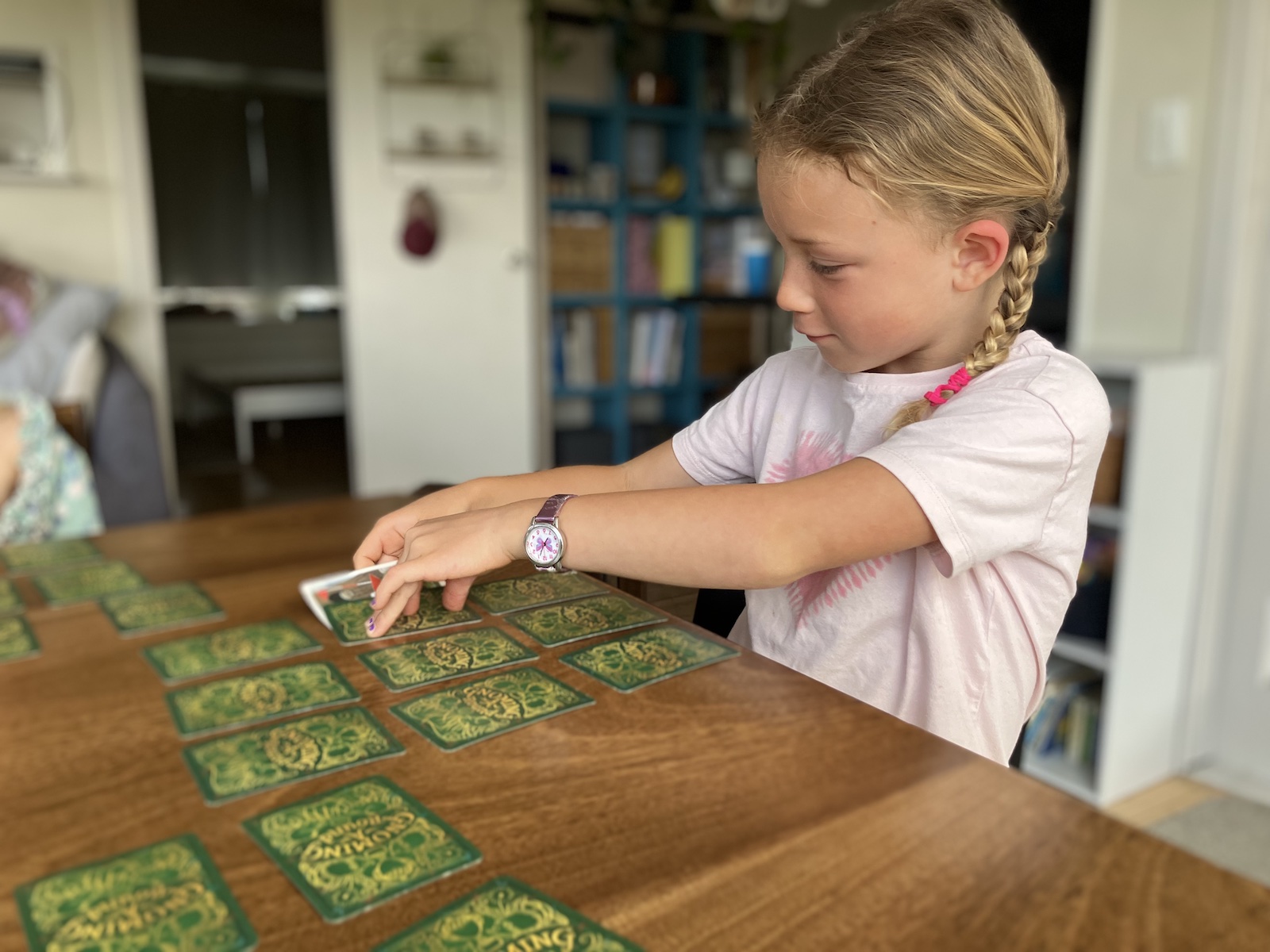 Girl Playing Card Game