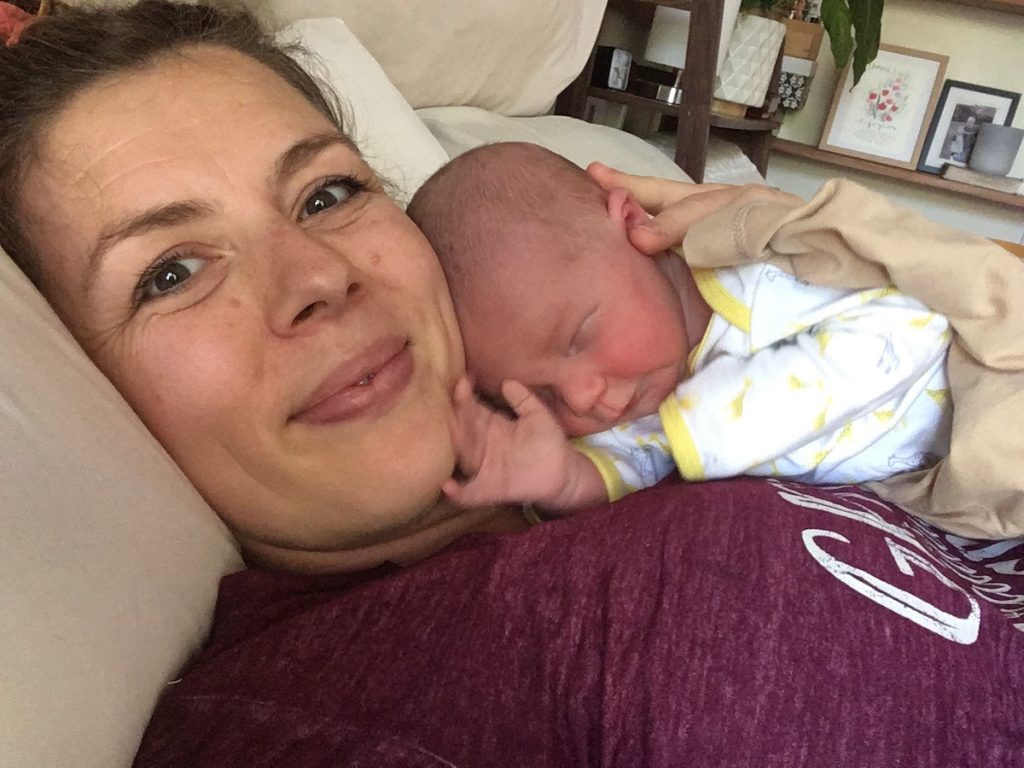 Mom and baby resting together after birth