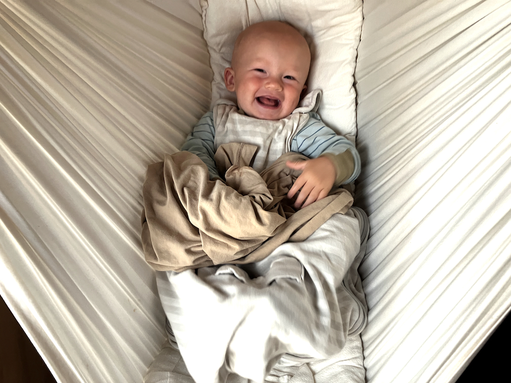 happy baby in infant sleep hammock