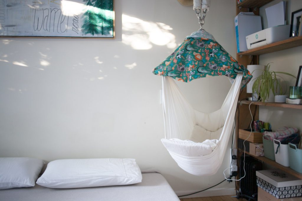 infant hammock hanging right next to parents' bed
