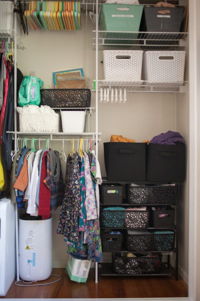 shared kids closet set up for four kids in one room