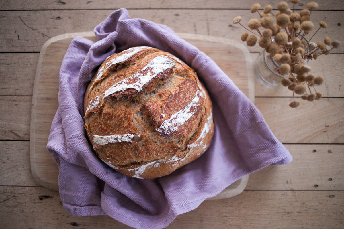 artisan sourdough bread recipe loaf on cutting board